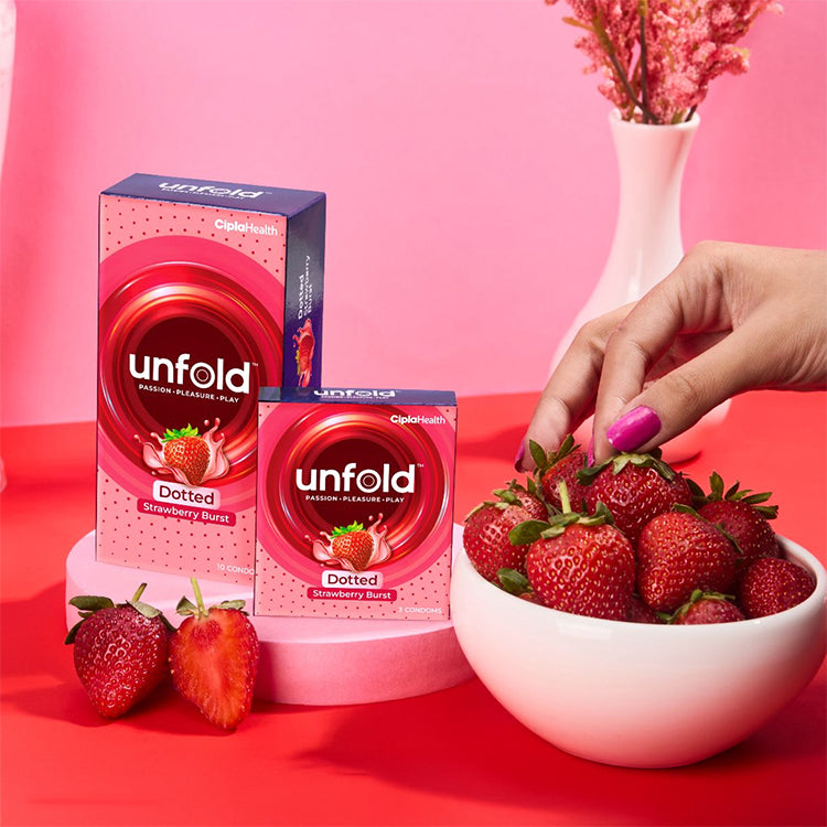 Image of UNFOLD Strawberry Dotted Condom